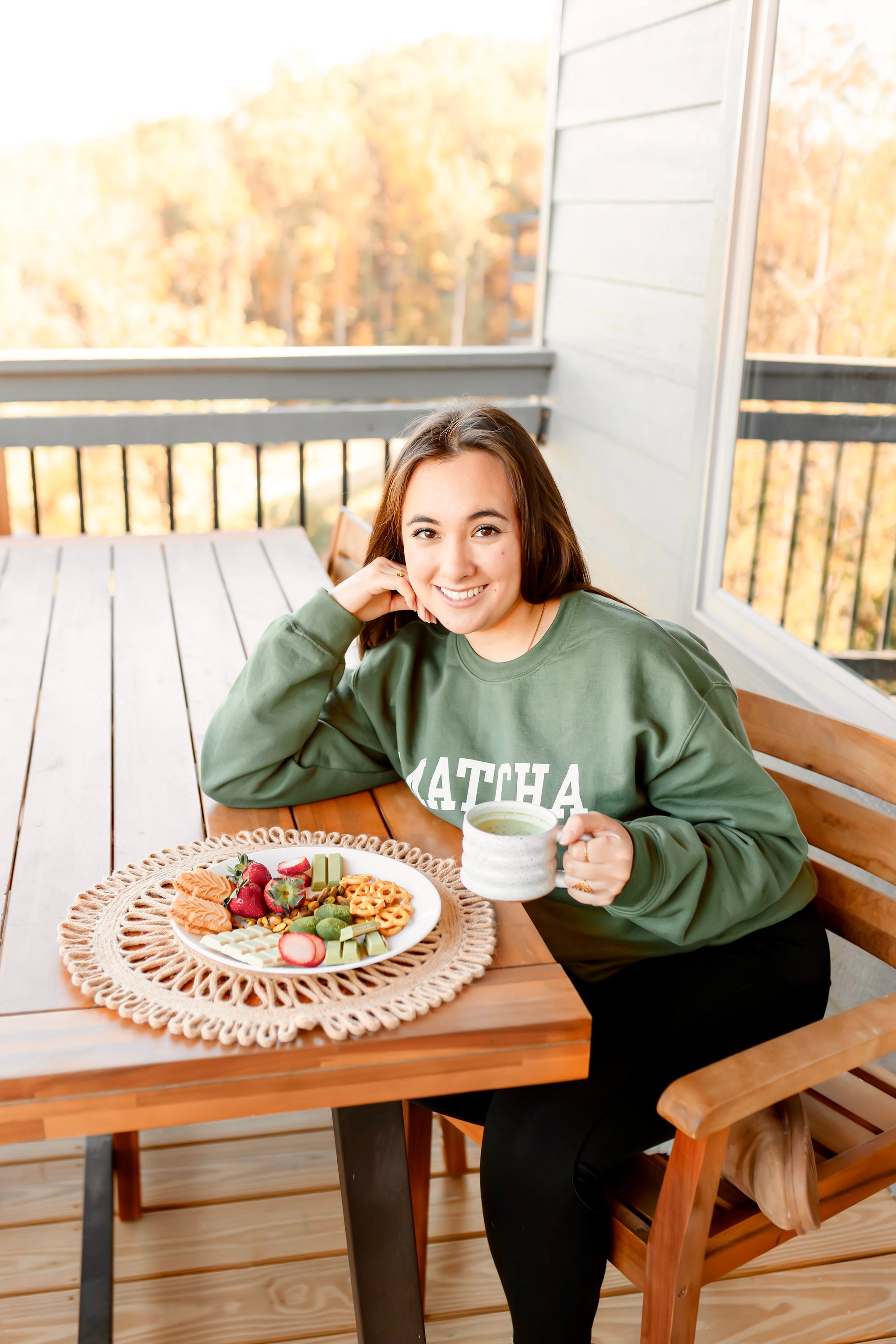 Unisex green MATCHA crewneck sweatshirt with Matcha Nude sleeve logo – printed by Moonlight Makers in Asheville, NC