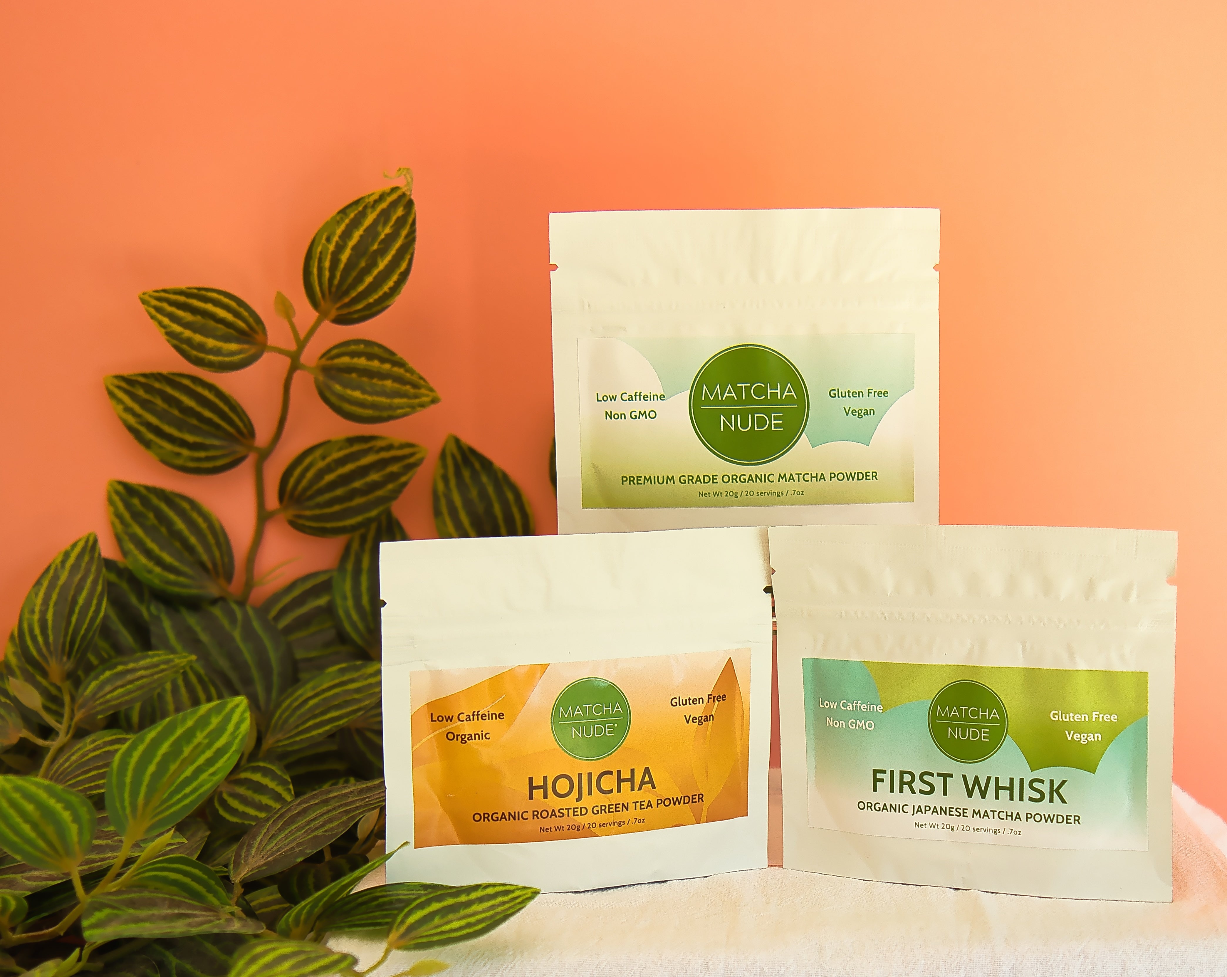 Three Matcha Nude organic tea pouches: Premium Organic Matcha powder, First Whisk Japanese matcha, and Hojicha roasted green tea powder