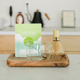 First Whisk Matcha Ritual Set with organic matcha, glass bowl, bamboo whisk and whisk holder