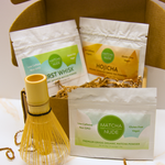 Matcha Nude Discovery Pack with Premium Matcha, First Whisk and Hojicha sampler bags inside kraft gift box
