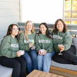 Unisex green MATCHA crewneck sweatshirt with Matcha Nude sleeve logo – printed by Moonlight Makers in Asheville, NC